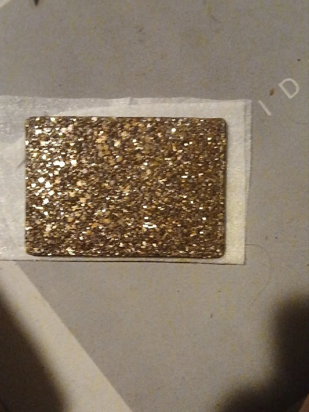 kate spade taupe leather card case with gold logo